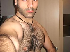 Hairy chested dude pulls out his cock and then masturbate